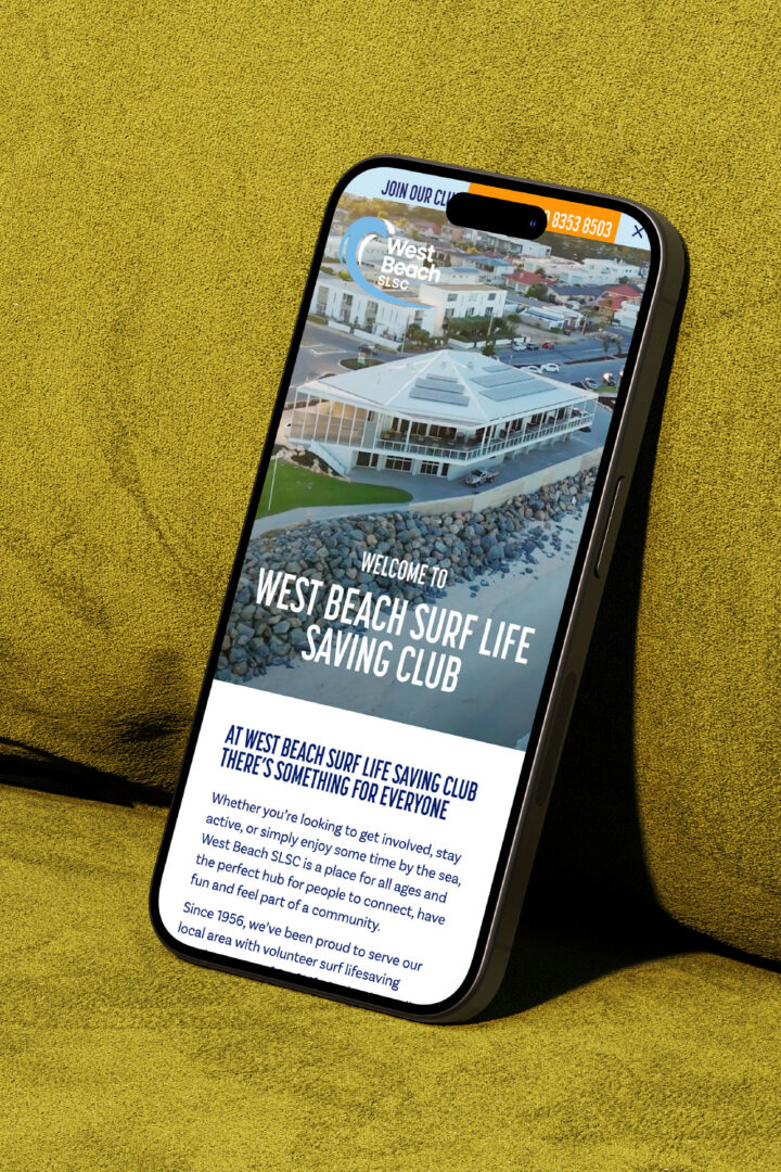 West Beach Surf Life Saving Club website shown on a phone